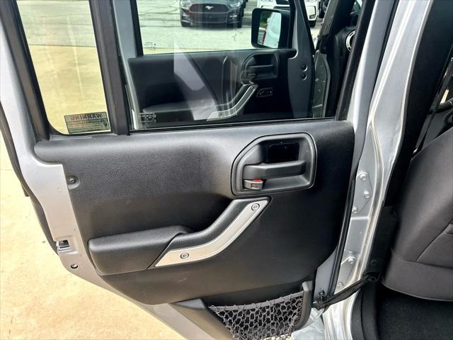 used 2013 Jeep Wrangler Unlimited car, priced at $12,997