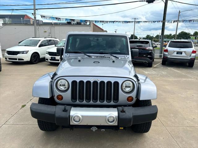 used 2013 Jeep Wrangler Unlimited car, priced at $12,997