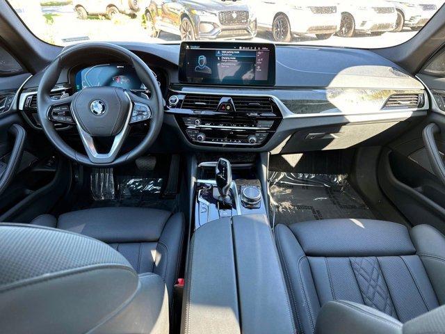 used 2023 BMW 530e car, priced at $53,991