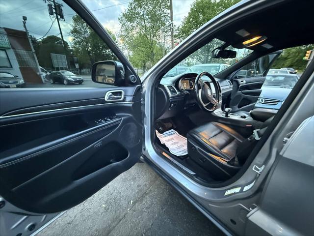 used 2014 Jeep Grand Cherokee car, priced at $11,899