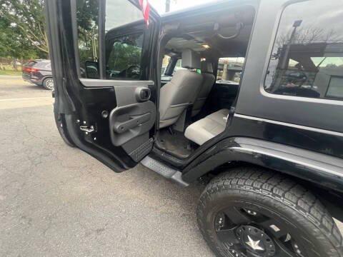 used 2009 Jeep Wrangler Unlimited car, priced at $12,999