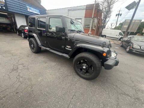 used 2009 Jeep Wrangler Unlimited car, priced at $12,999