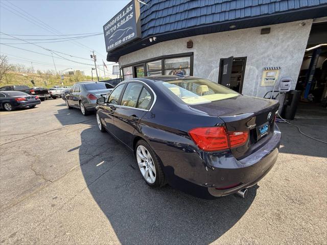 used 2015 BMW 335 car, priced at $16,199