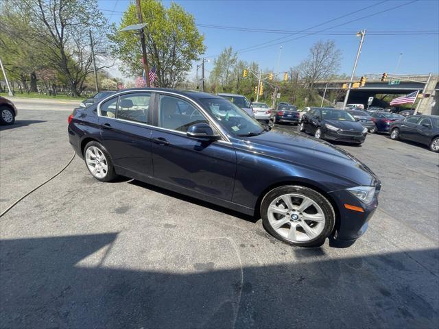 used 2015 BMW 335 car, priced at $16,199