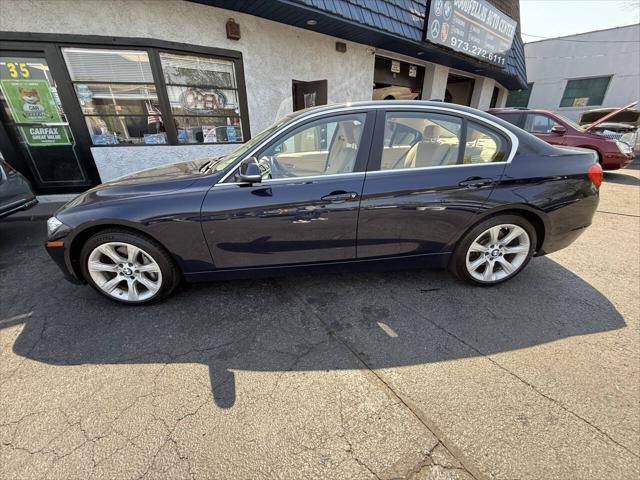 used 2015 BMW 335 car, priced at $16,199