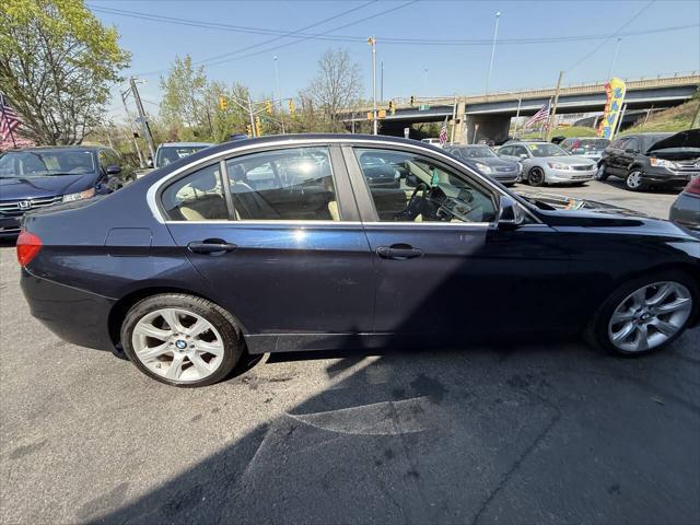used 2015 BMW 335 car, priced at $16,199