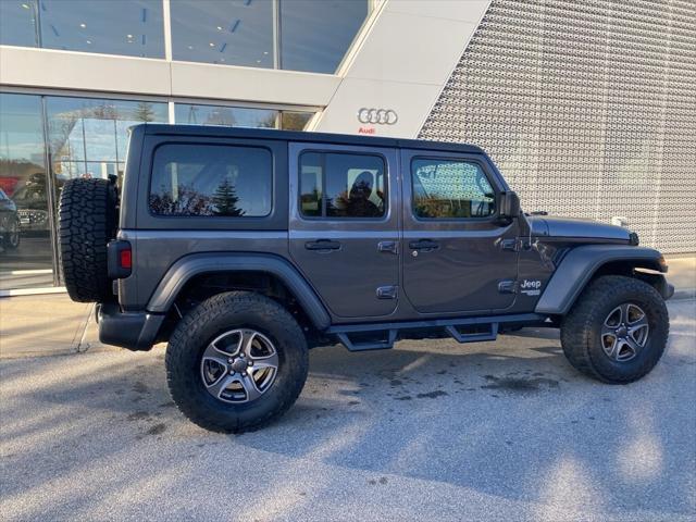 used 2018 Jeep Wrangler Unlimited car, priced at $27,144