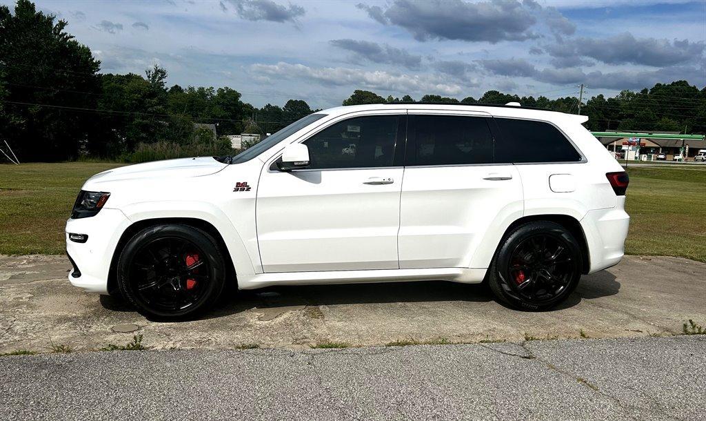 used 2014 Jeep Grand Cherokee car, priced at $28,495