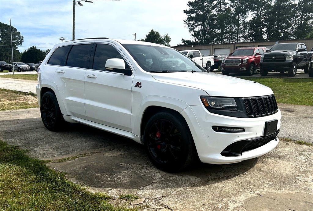 used 2014 Jeep Grand Cherokee car, priced at $28,495