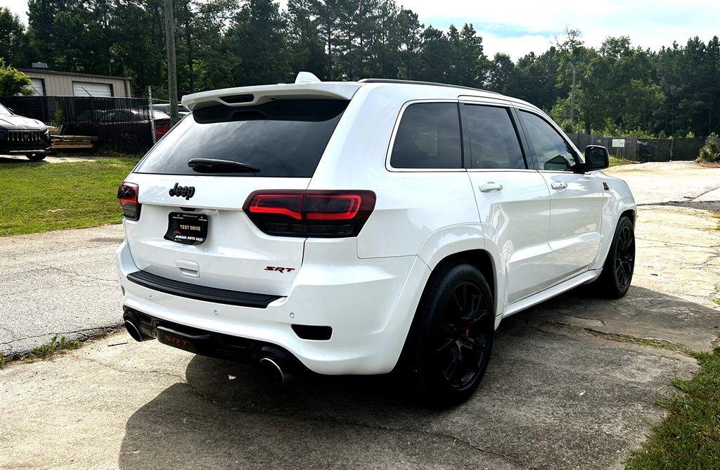 used 2014 Jeep Grand Cherokee car, priced at $28,495