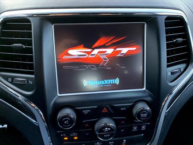 used 2014 Jeep Grand Cherokee car, priced at $27,995