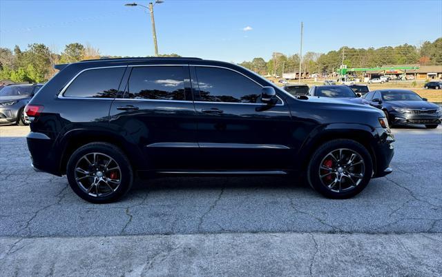 used 2014 Jeep Grand Cherokee car, priced at $25,995