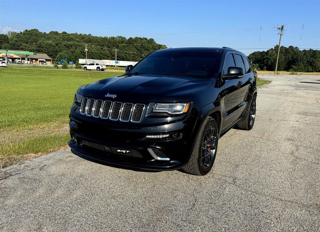 used 2014 Jeep Grand Cherokee car, priced at $23,995
