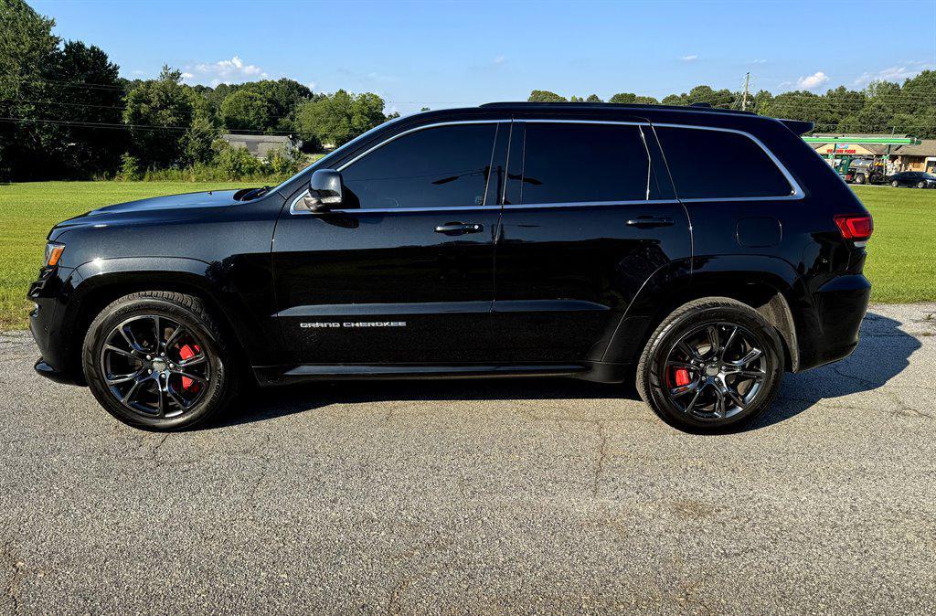 used 2014 Jeep Grand Cherokee car, priced at $23,995