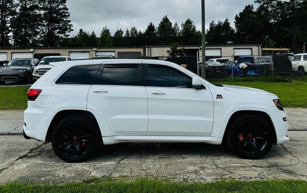 used 2014 Jeep Grand Cherokee car, priced at $26,995