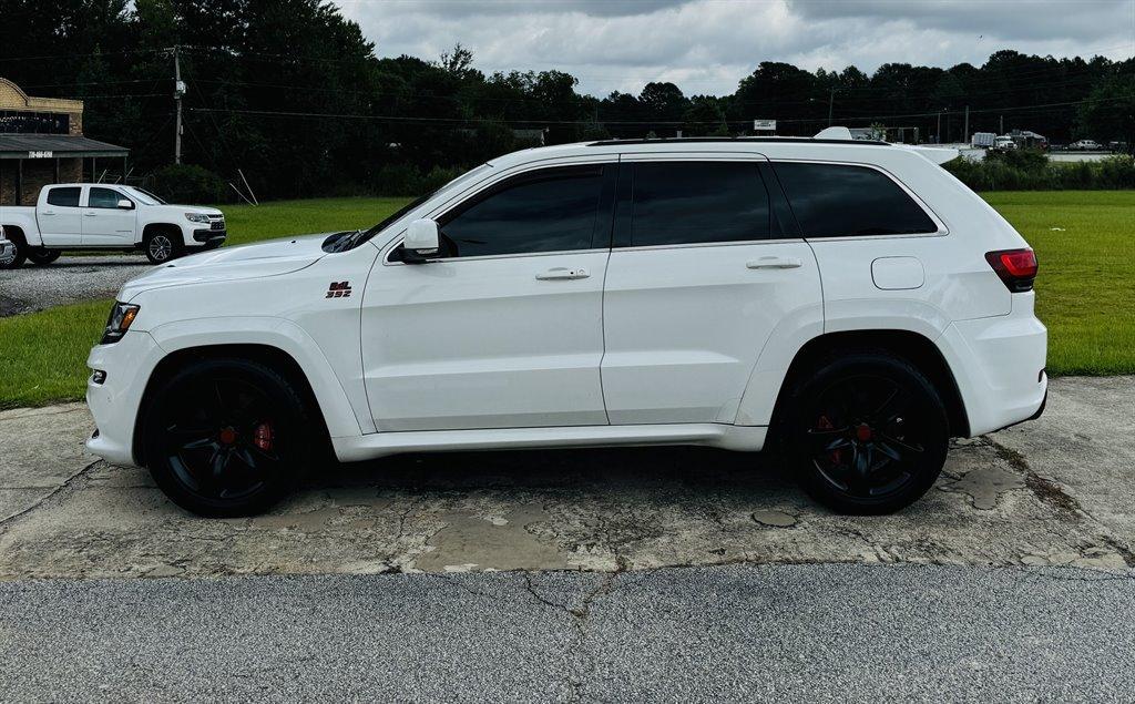 used 2014 Jeep Grand Cherokee car, priced at $26,995