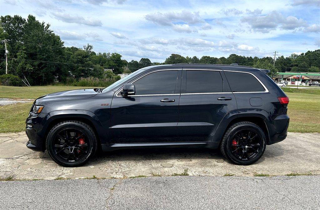 used 2014 Jeep Grand Cherokee car, priced at $29,995