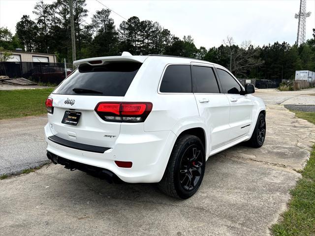 used 2014 Jeep Grand Cherokee car, priced at $29,995