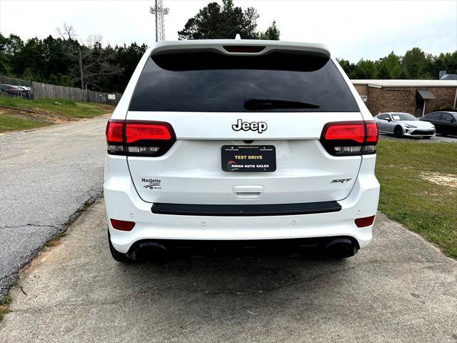 used 2014 Jeep Grand Cherokee car, priced at $29,995