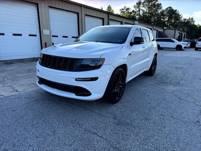 used 2014 Jeep Grand Cherokee car, priced at $25,995
