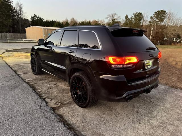 used 2014 Jeep Grand Cherokee car, priced at $29,995