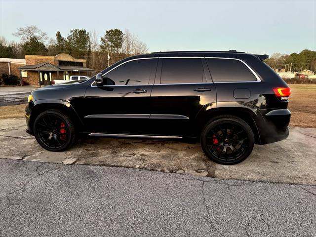 used 2014 Jeep Grand Cherokee car, priced at $29,995