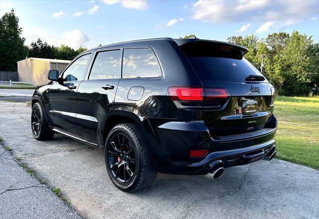 used 2014 Jeep Grand Cherokee car, priced at $29,995