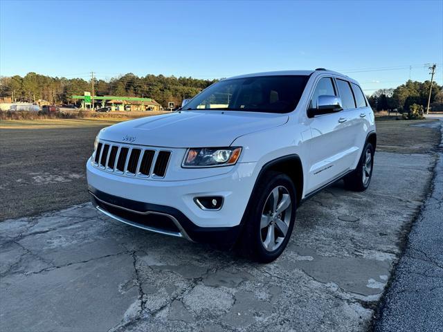 used 2014 Jeep Grand Cherokee car, priced at $13,995