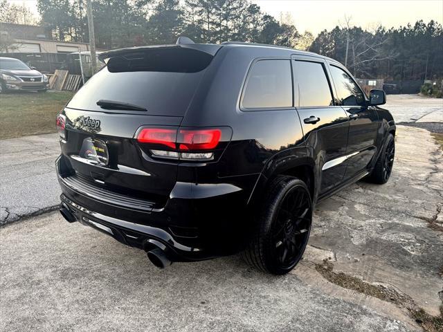 used 2014 Jeep Grand Cherokee car, priced at $25,995