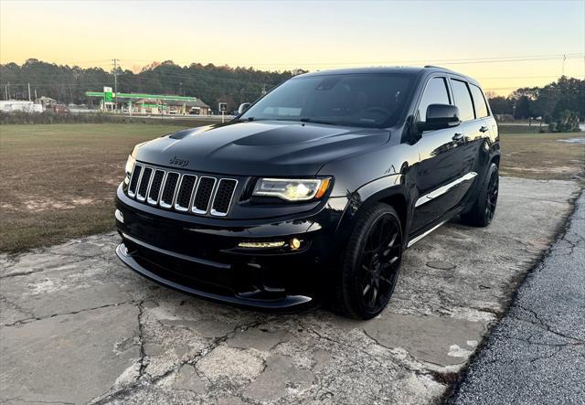 used 2014 Jeep Grand Cherokee car, priced at $25,995