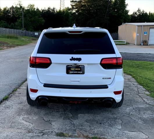 used 2014 Jeep Grand Cherokee car, priced at $29,995