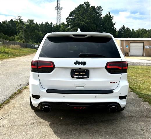 used 2014 Jeep Grand Cherokee car, priced at $27,995