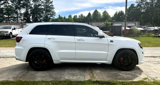 used 2014 Jeep Grand Cherokee car, priced at $27,995
