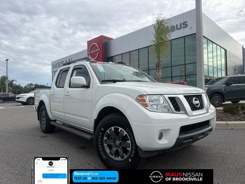 used 2014 Nissan Frontier car, priced at $16,998