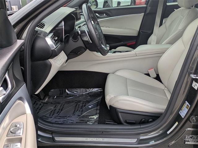 used 2023 Genesis G70 car, priced at $27,997