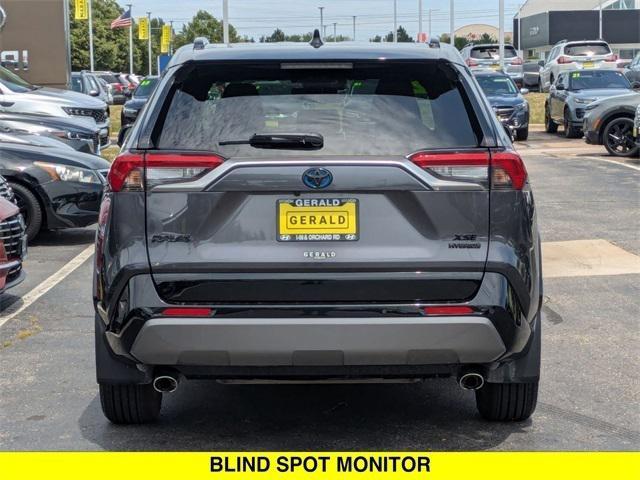 used 2021 Toyota RAV4 Hybrid car, priced at $34,999