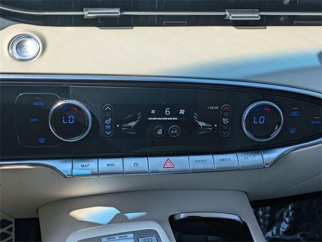 used 2023 Genesis GV70 car, priced at $52,897