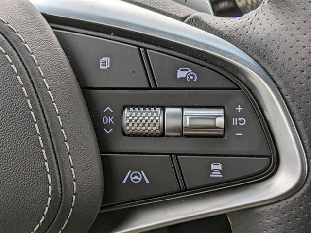 used 2024 Genesis GV70 car, priced at $56,597