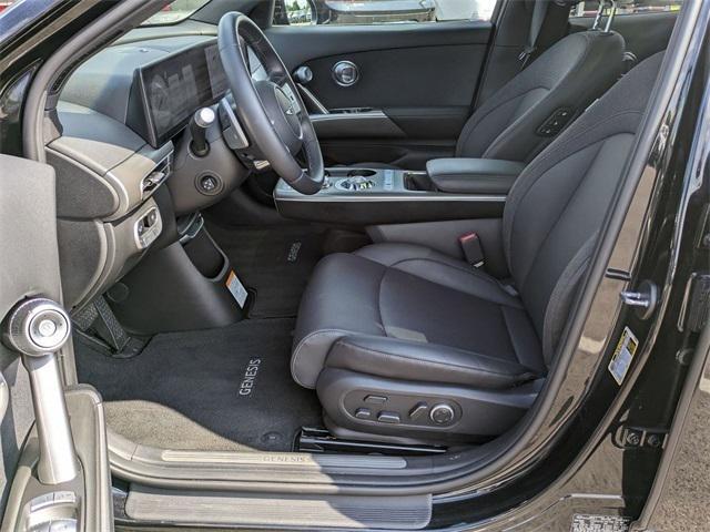 used 2025 Genesis GV60 car, priced at $54,997