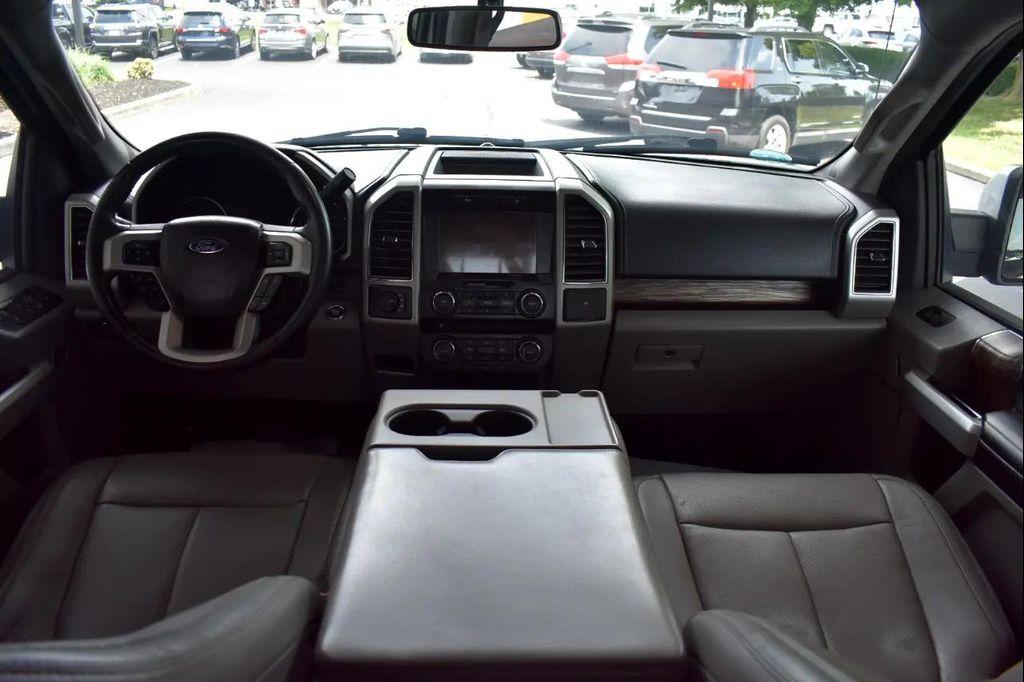 used 2018 Ford F-150 car, priced at $23,497