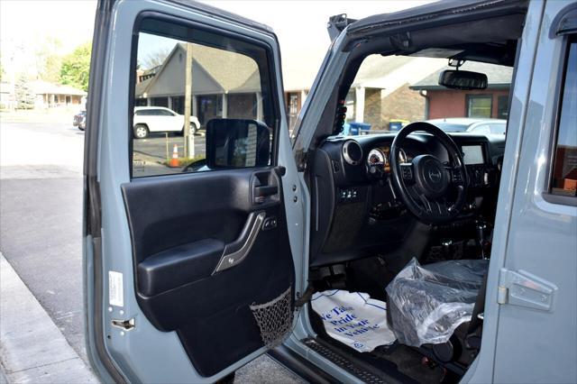 used 2015 Jeep Wrangler Unlimited car, priced at $21,697