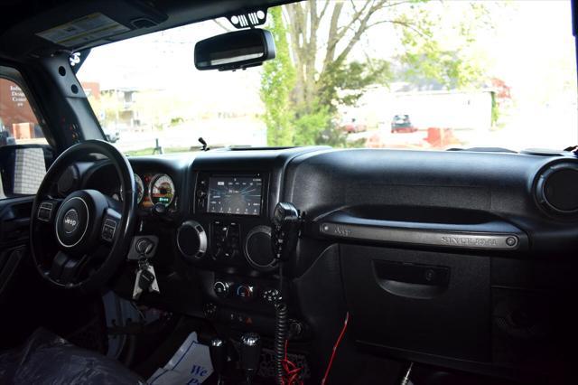 used 2015 Jeep Wrangler Unlimited car, priced at $21,697