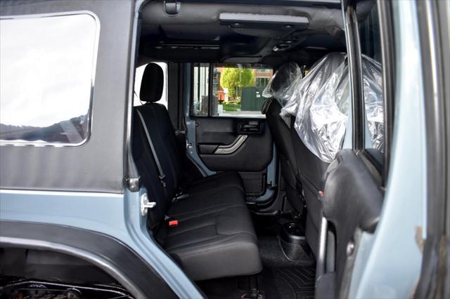 used 2015 Jeep Wrangler Unlimited car, priced at $21,697