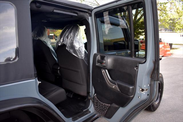 used 2015 Jeep Wrangler Unlimited car, priced at $21,697