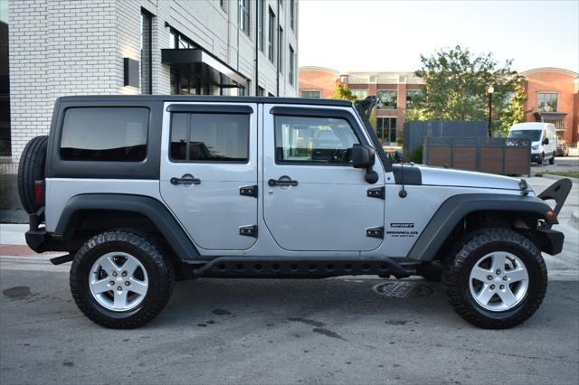 used 2015 Jeep Wrangler Unlimited car, priced at $19,797