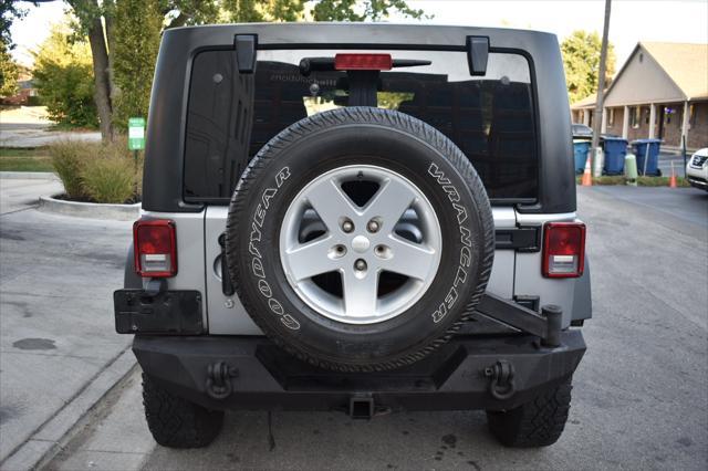 used 2015 Jeep Wrangler Unlimited car, priced at $19,797