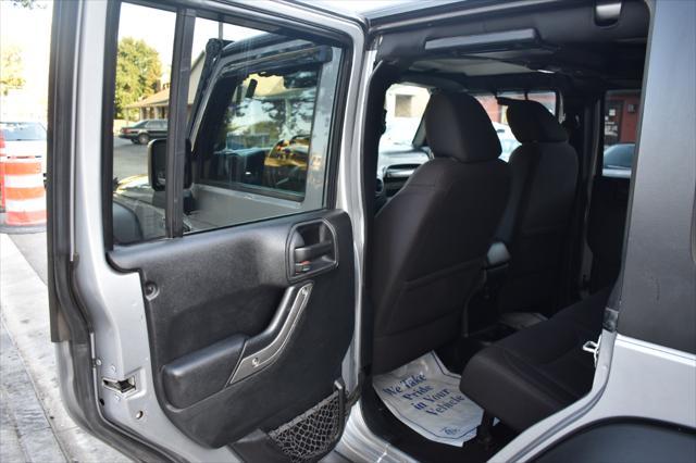 used 2015 Jeep Wrangler Unlimited car, priced at $19,797