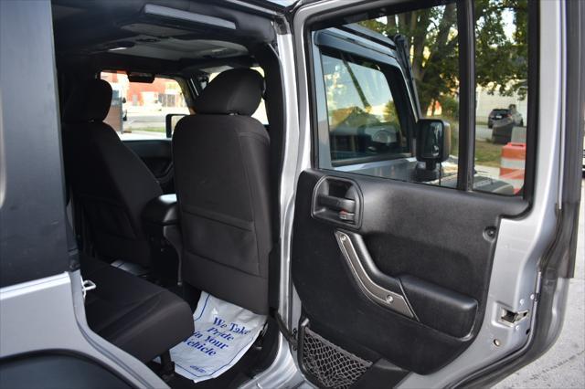 used 2015 Jeep Wrangler Unlimited car, priced at $19,797