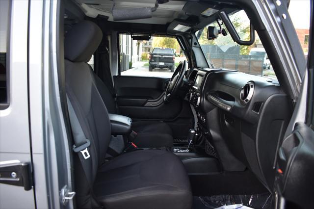 used 2015 Jeep Wrangler Unlimited car, priced at $19,797