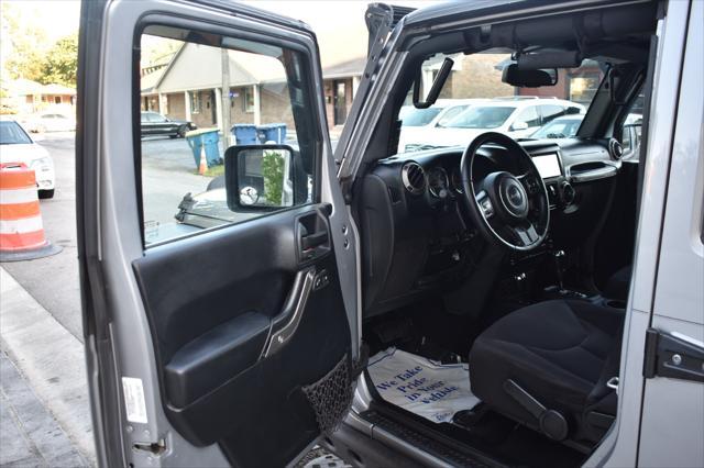 used 2015 Jeep Wrangler Unlimited car, priced at $19,797